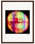 A framed fine art print in a dark wood frame features a circular, textured lips pattern in vivid red, yellow, green, purple, and black on a white background. Signed in the bottom right corner—ideal for conscious interior design.