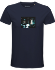 A French Navy t-shirt featuring a centered rectangular art print of a blurred, dark scene with a standing figure and car lights. "Abundance" is printed on the inner neckline, reflecting mindful apparel.