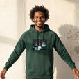 Abundance - "Vibe of Life" Bottle Green Hoodie worn against a sunlit plaster wall