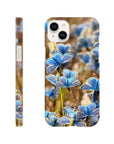 A phone case featuring photo art with a close-up of blue butterflies on grass, shown from the back and side angles against a white background. The word INTENTION appears near the bottom, highlighting beautiful textures in the design.