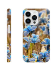 A phone case featuring photo art with a close-up of blue butterflies on textured brown grass. The design covers the back and sides, with the word INTENTION printed near the bottom.