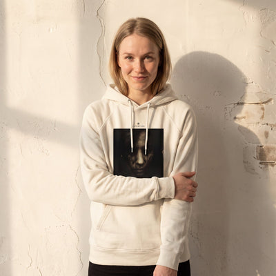 Fearless - "Face It" Off White Hoodie worn against a sunlit plaster wall