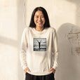Grateful - "Circle of Life" Off White Long Sleeve worn against a sunlit plaster wall