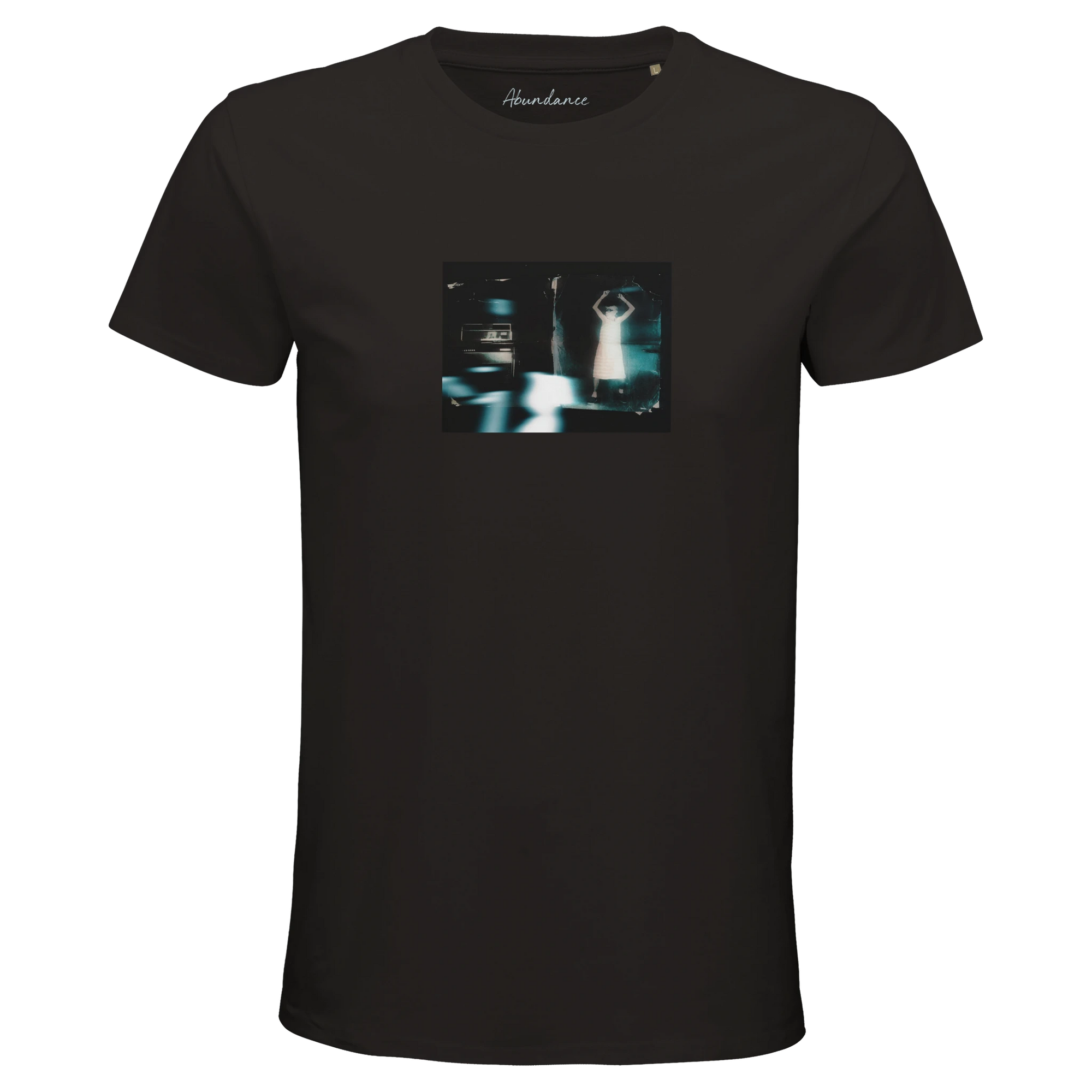 A deep black short-sleeve t-shirt from mindful apparel showcases a small, rectangular chest graphic with a blurry, blue-tinted image of a person standing arms raised next to a car at night.
