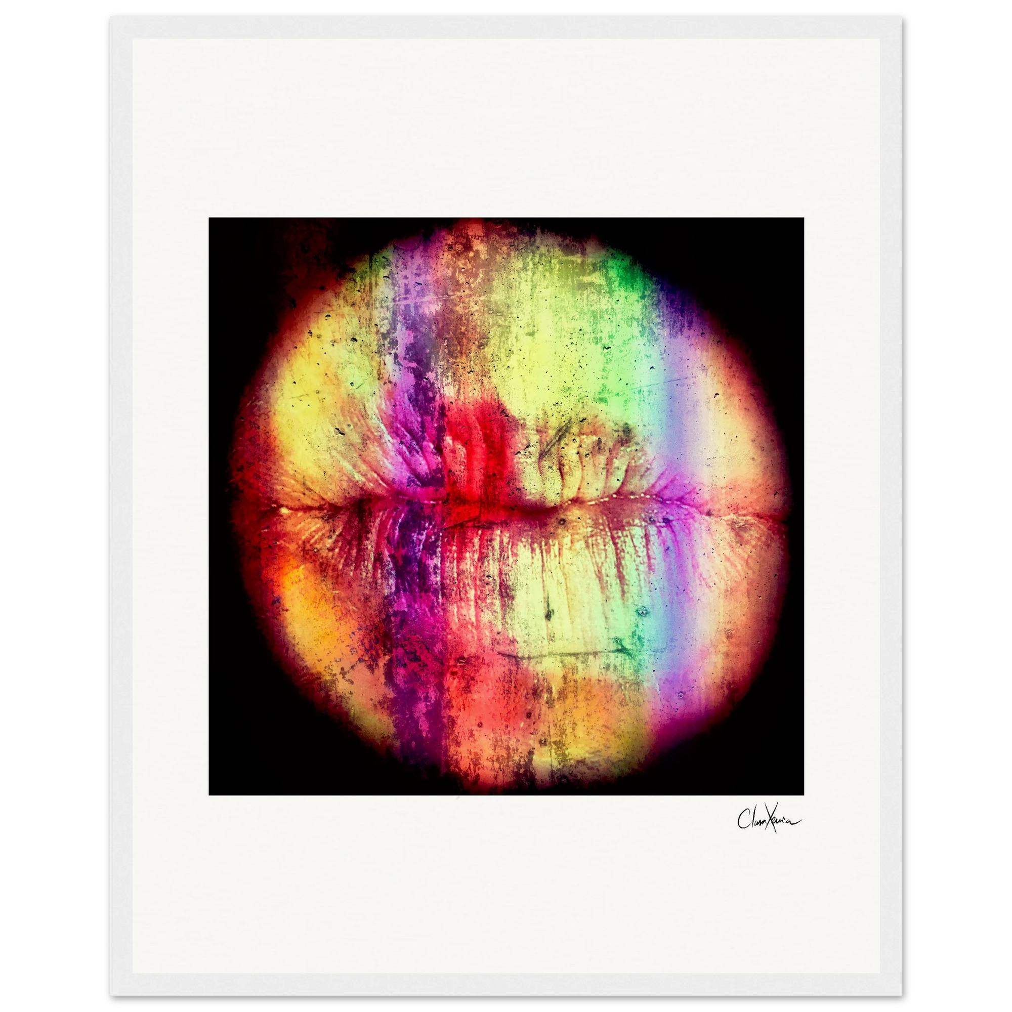 A colorful, abstract image of lips with vibrant red, green, yellow, and purple streaks appears through a circular lens effect. This fine art print features a white frame and is signed in the lower right corner.