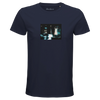 A French Navy t-shirt featuring a centered rectangular art print of a blurred, dark scene with a standing figure and car lights. "Abundance" is printed on the inner neckline, reflecting mindful apparel.