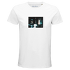 A white T-shirt with a small, centered rectangular art print of a blurred figure with raised arms near a car at night. “Abundance” is printed inside the collar for mindful detail. Color: White.