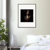 A fine art print of a person’s face with dark hair hangs above a bed with white bedding, creating a conscious interior design. A small table with a white vase and green plant sits beside the bed.