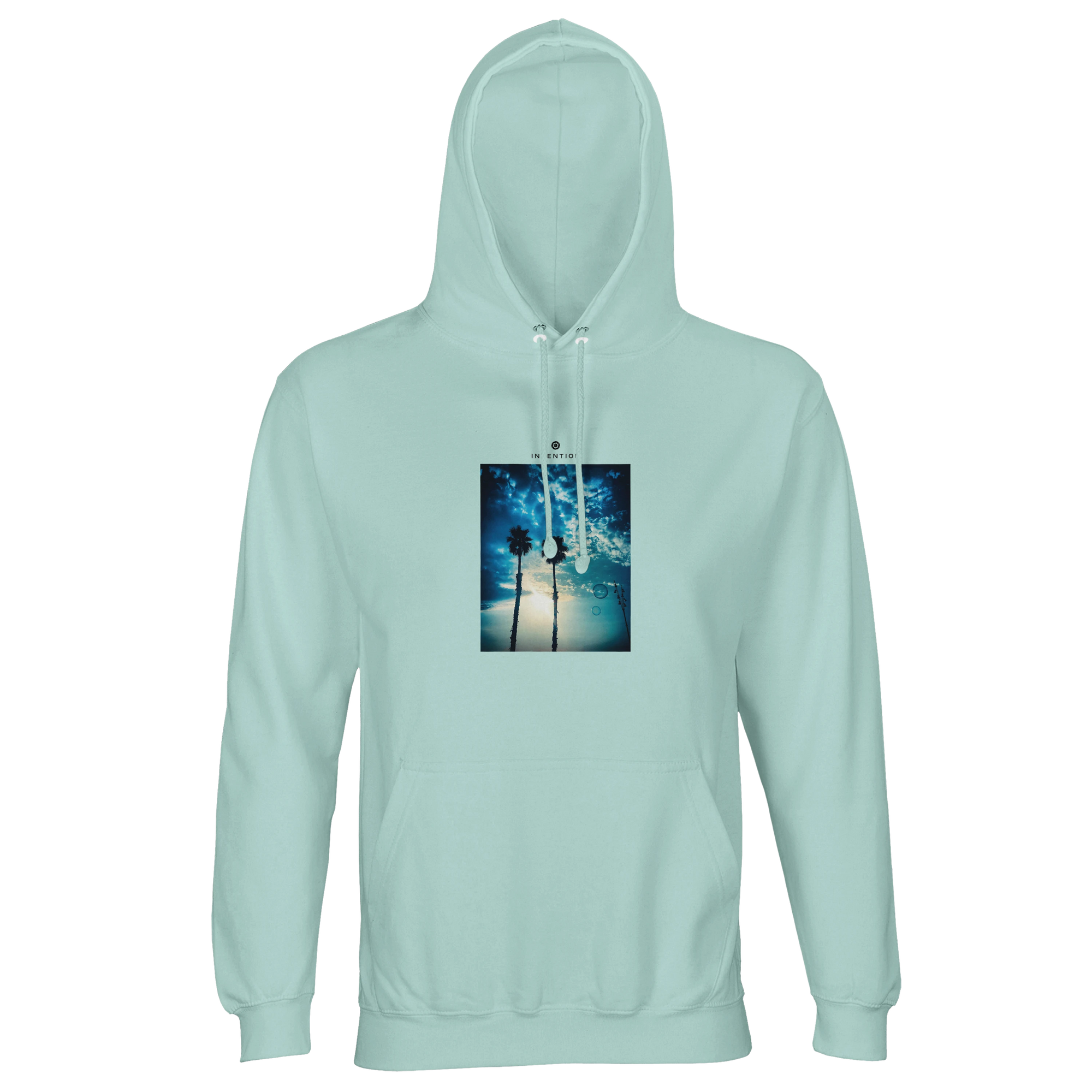 Arctic blue hooded sweatshirt with an art print of two palm trees silhouetted against a bright, cloud-streaked sky. Features include a front pocket and drawstrings for mindful comfort.