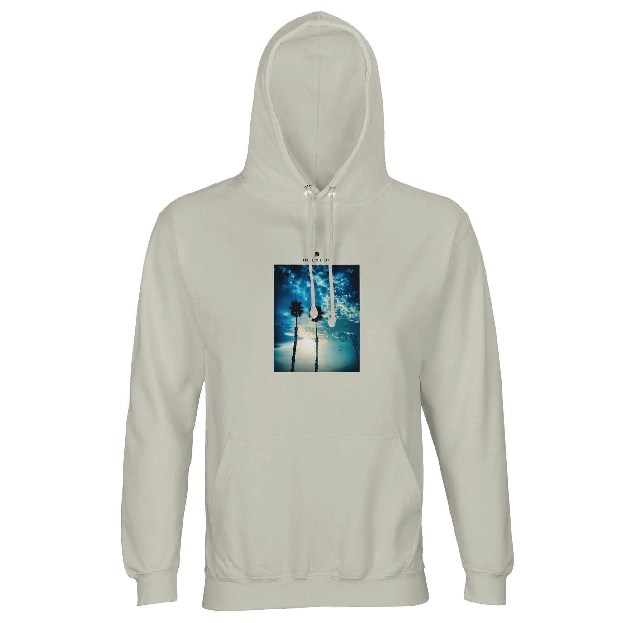 An ash-colored hooded sweatshirt featuring an art print of two palm trees under a blue sky with clouds and sunlight, perfect for conscious fashion enthusiasts.