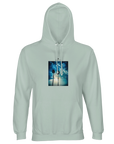 Creamy green hooded sweatshirt featuring a centered art print of two palm trees, blue sky, and sunlight. This mindful apparel includes a front pocket and drawstrings for comfort and style.