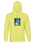 A light yellow hooded sweatshirt with an art print of two palm trees against a blue sky and sunlight filtering through branches, designed as mindful apparel for those who value style and conscious living.