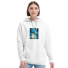 A person wearing a white hoodie from mindful apparel, featuring a printed image of palm trees and a blue sky with clouds on the front, stands against a plain white background.