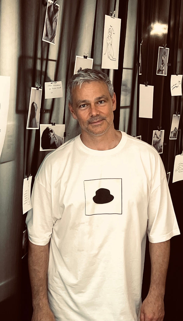 @gubanovsergey wearing the Word of Intention Freedom with Photo Art Hat On