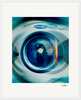 A close-up, stylized photo of the front of an Electrolux washing machine with colorful blue and green light reflections. The centered round glass door and artist’s signature make it ideal as framed wall art for conscious interior design.