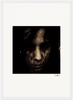 A grainy, sepia-toned close-up of a person’s face with long hair partially covering their features, set against a white background with a signature in the lower right corner—ideal as a fine art print for conscious interior design.