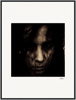 A close-up portrait of a person with long, dark hair partially covering their face, looking downward with a serious expression in a grainy, high-contrast, monochromatic style. Finished as framed wall art with a sleek white border.