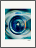 A close-up image of the front door of an Electrolux washing machine, with a blue tint and circular light reflections. This fine art print is framed and signed in the bottom right corner—perfect for conscious interior design.