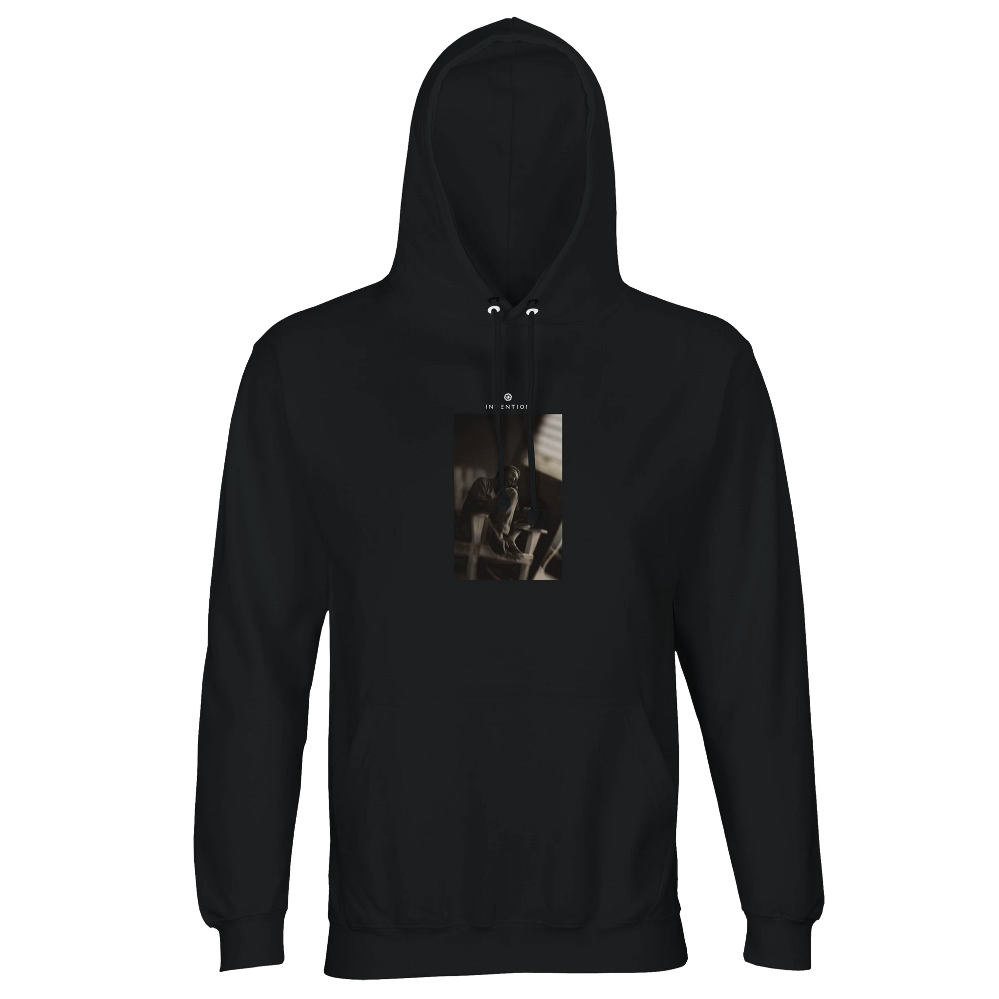 A black hooded sweatshirt featuring a small, centered sepia print of a bicycle handlebar and brake lever on the chest, designed for mindful apparel enthusiasts. The background is plain white.