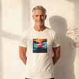 Alive - "Moving Smiles" Off White T-shirt worn against a sunlit plaster wall