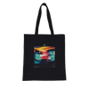 A black tote bag with long handles displays a vivid art print of two abstract, blended faces and "INTENTION" above—perfect for mindful, conscious fashion lovers. The background is plain white.