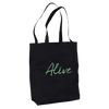 A black tote bag with two handles features the word Alive printed in light green script on the front. Made from organic material, this mindful apparel piece stands out against a plain white background.