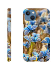 Phone case featuring an art print of blue butterflies and textured brown grass, shown from the back and side views. The photo art design includes the word INTENTION at the bottom on the back view.