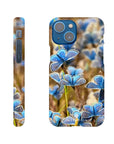 A phone case featuring a close-up photo art of multiple blue butterflies resting on plants, shown from the back and side, with beautiful textures. The word INTENTION is printed near the bottom of the case.