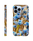 A phone case featuring photo art of several blue butterflies on brown and green foliage, shown from back and side angles. The word INTENTION is printed near the bottom, highlighting the textures of nature in a stunning art print.