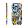 A phone case featuring photo art of several blue butterflies on brown and green foliage, shown from back and side angles. The word INTENTION is printed near the bottom, highlighting the textures of nature in a stunning art print.