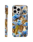 A smartphone case featuring a close-up photo art design of blue butterflies on flowers, shown from the back and side view. The word INTENTION is printed near the bottom, highlighting elegant textures.