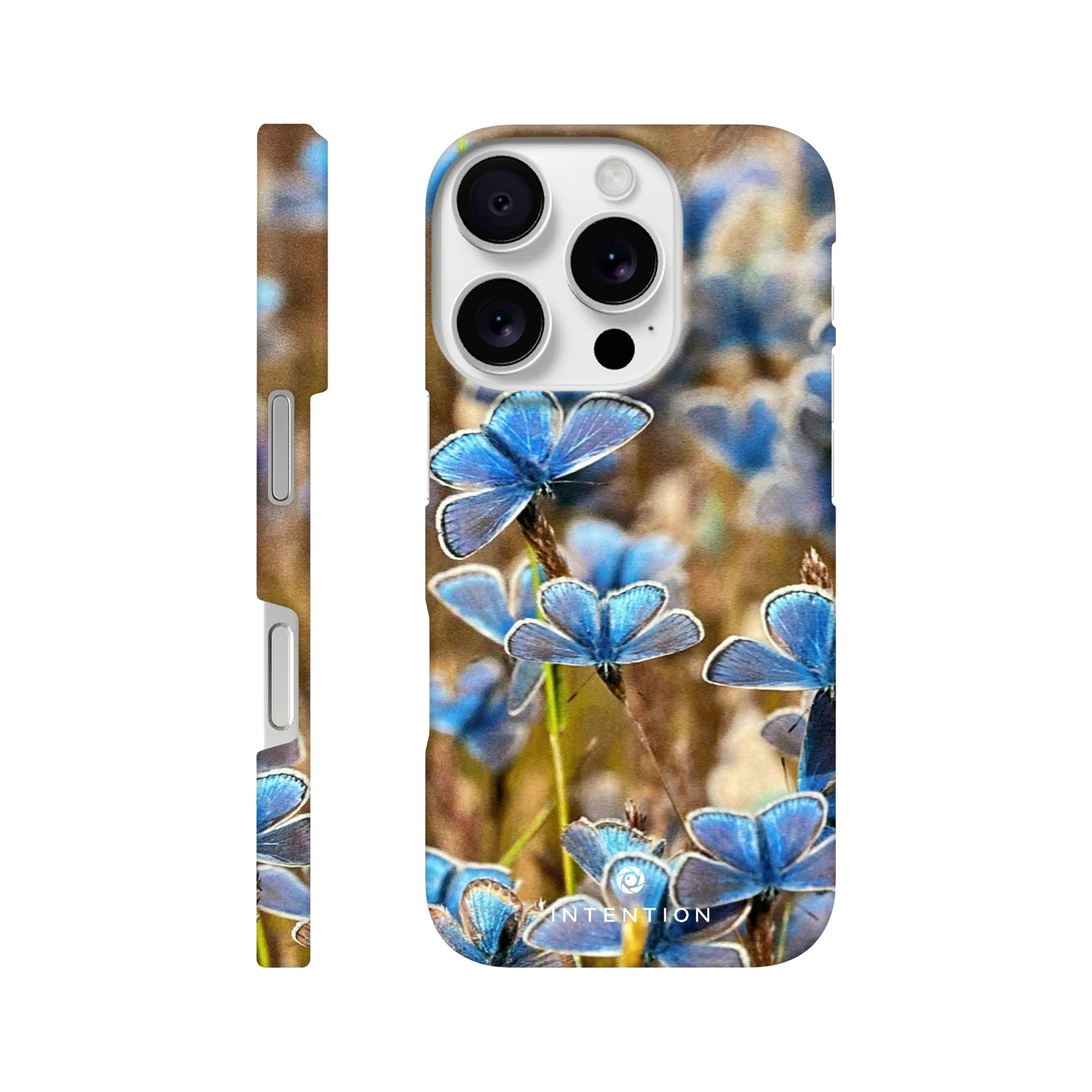 A phone case showcasing a photo art close-up of blue butterflies resting on plants in a field, with the word INTENTION and a small circular logo near the bottom. Subtle textures add depth to this unique design.