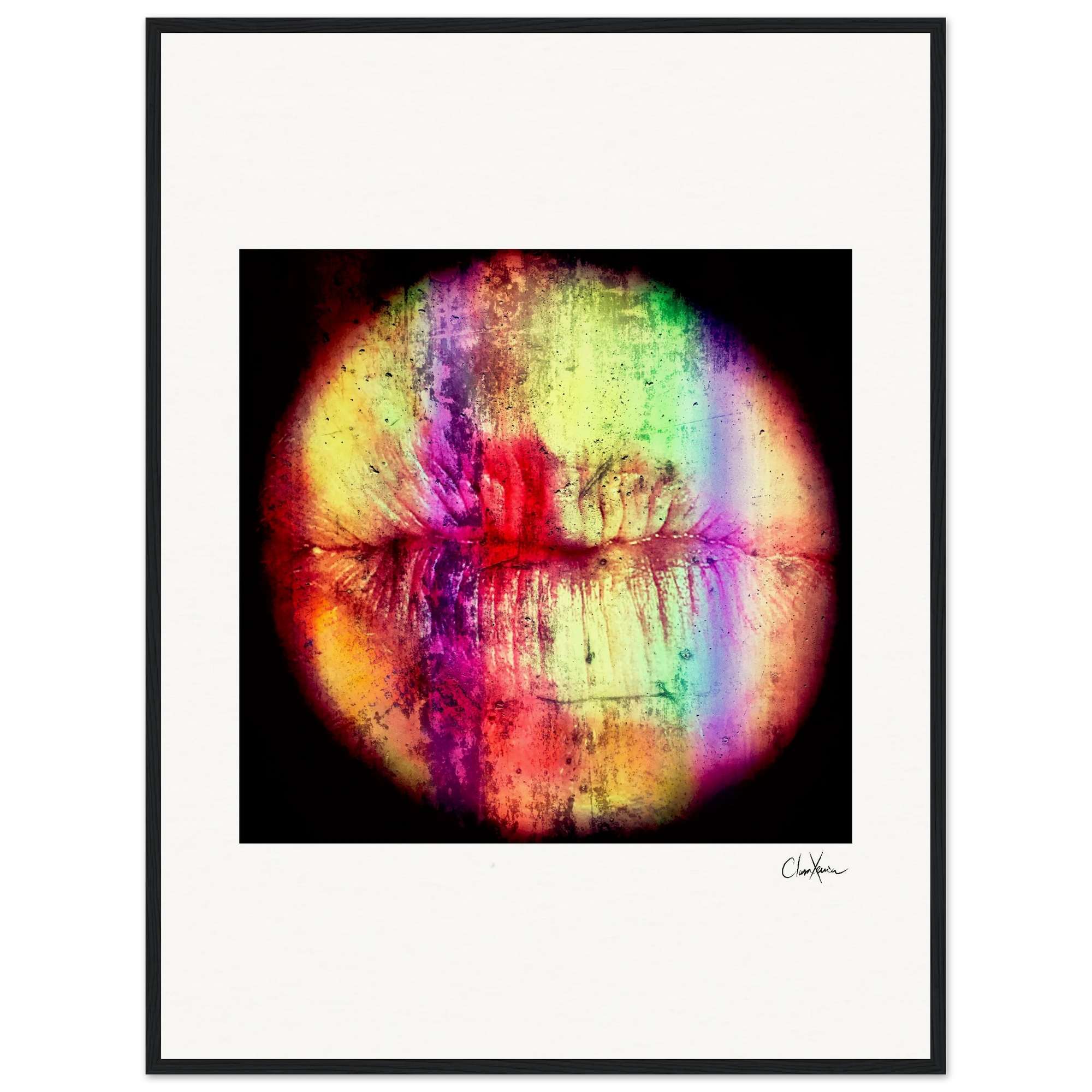 A close-up of lips features vivid rainbow stripes and abstract textures, framed in black with a white background and a small signature at the bottom right.