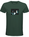 A bottle green T-shirt from mindful apparel features a rectangular chest print of a blurry nighttime scene with a car and a person standing, hands raised. "Abundance" is printed inside the collar.