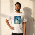 Gratitude - "Bubbles and Sky Sticks" White T-shirt worn against a sunlit plaster wall