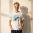 Jazzy - "Lacey Leg" White T-shirt worn against a sunlit plaster wall