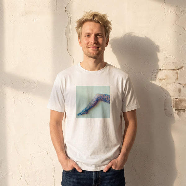 Jazzy - "Lacey Leg" White T-shirt worn against a sunlit plaster wall