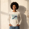 Jazzy - "Lacey Leg" Off White Long Sleeve worn against a sunlit plaster wall