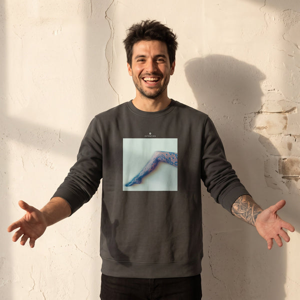 Jazzy - "Lacey Leg" deep charcoal grey Sweatshirt worn against a sunlit plaster wall