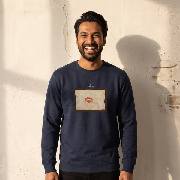 Lucky - "Kiss my Ass" French Navy Sweatshirt worn against a sunlit plaster wall
