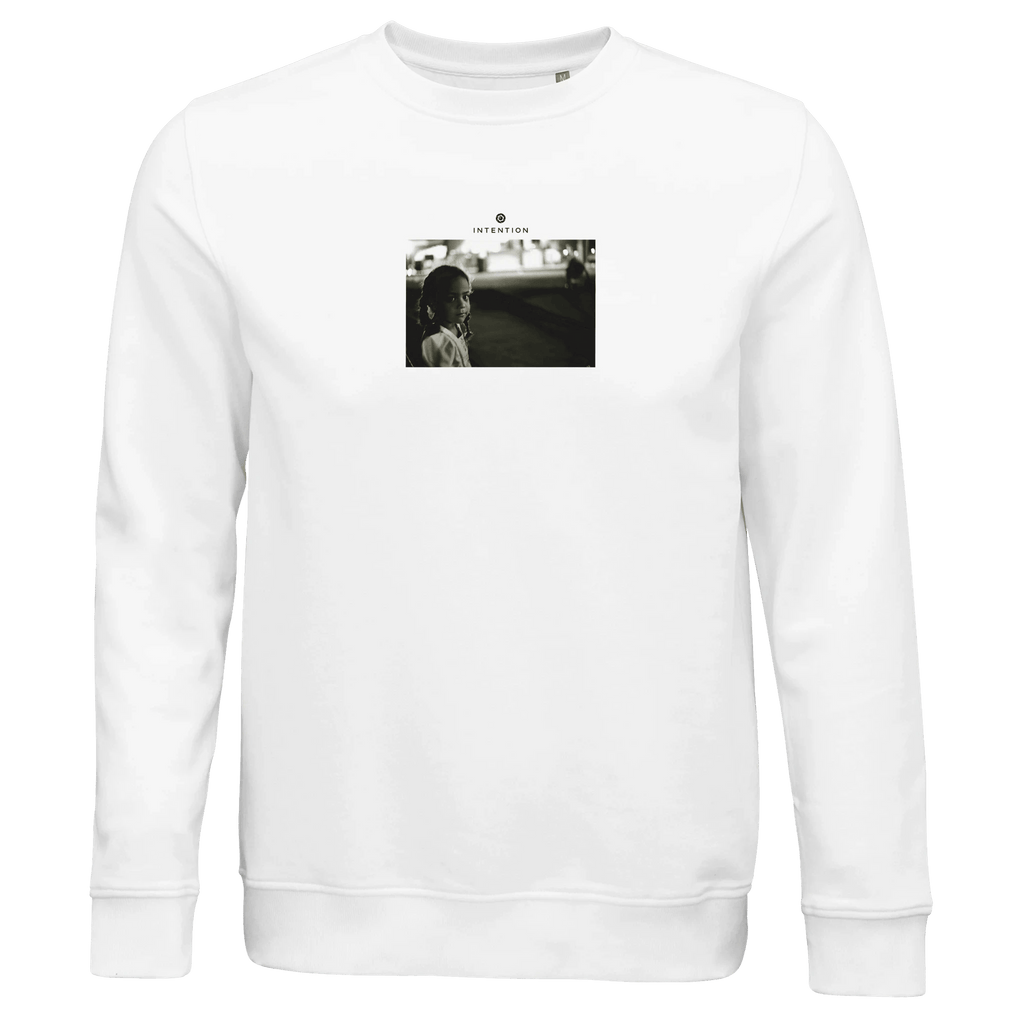 A white crew-neck sweatshirt with a small, centered black-and-white outdoor photo of a person and "INTERFERIS." text above—perfect for mindful, conscious fashion enthusiasts.
