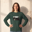 Presence - "Cuba Girl" Bottle Green Sweatshirt worn against a sunlit plaster wall