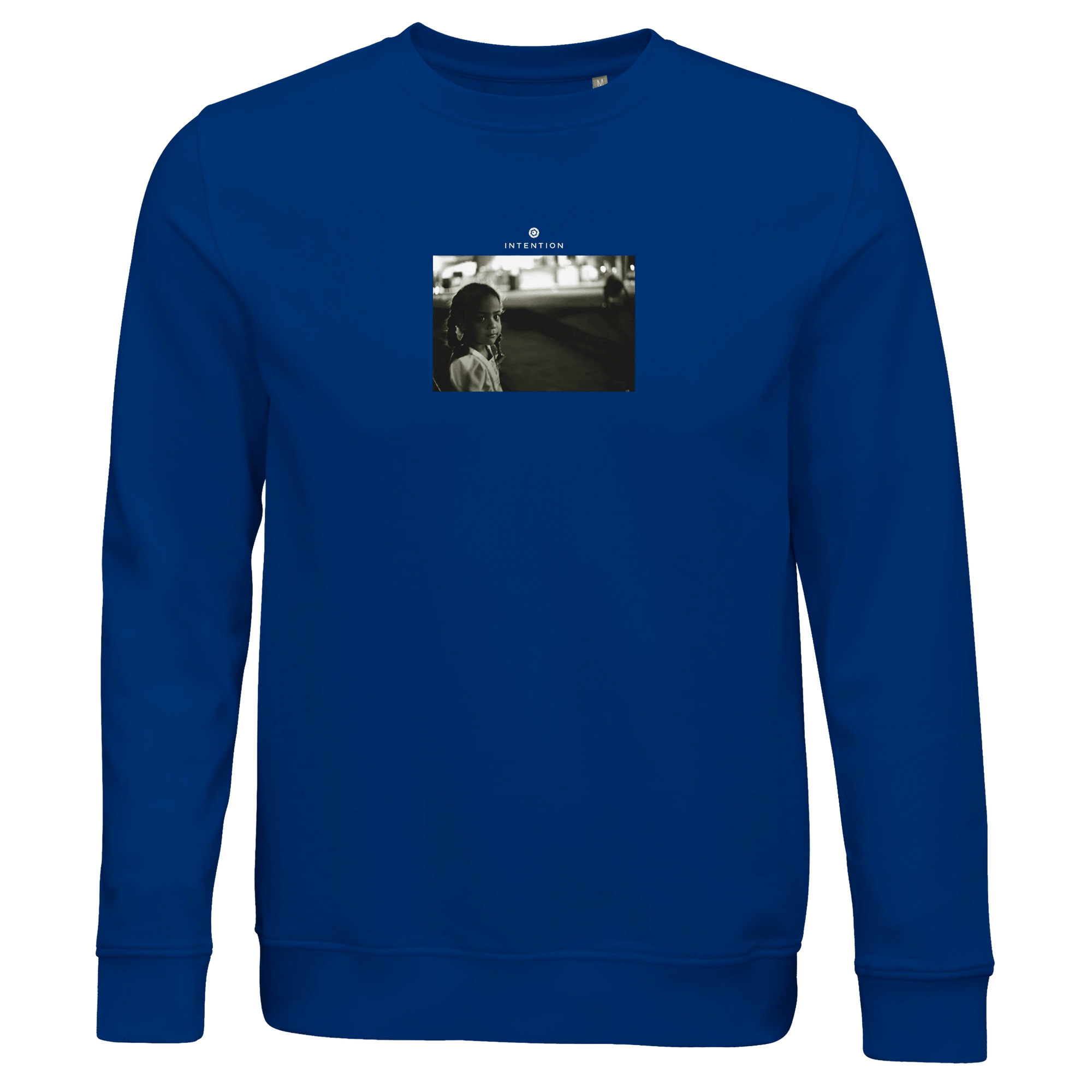 A royal blue sweatshirt with a centered black-and-white photo of a person facing the camera and “YOUTHVISION” above the image—designed for those who value mindful apparel and thoughtful design.