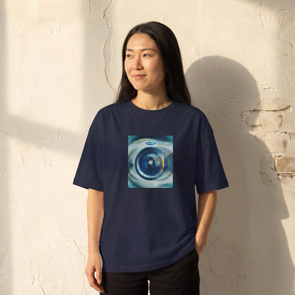 Real - "Around and Around" French Navy T-shirt worn against a sunlit plaster wall