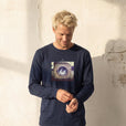 Resilience - "Wash It" French Navy Long Sleeve worn against a sunlit plaster wall