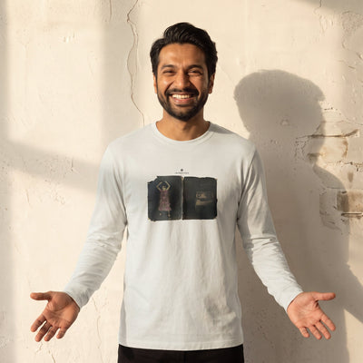 Vibrant - "Never too Late" Off White Long Sleeve worn against a sunlit plaster wall